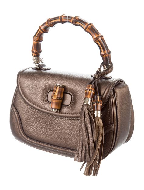 gucci bamboo daily top handle medium|gucci handbags with bamboo handles.